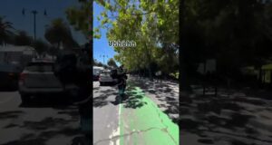 Harley wheelie right by the police! uhohh